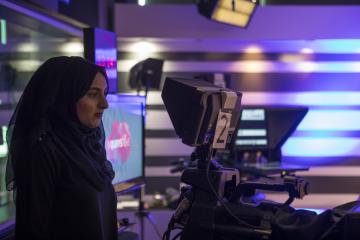 Camera and operator at Quays News studio